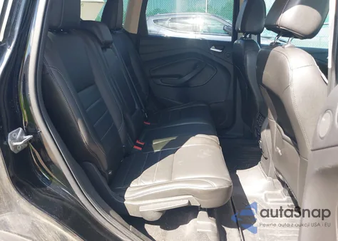 2016 Ford Escape Titanium z USA, uszkodzony, nr VIN 1FMCU9J90GUA43187